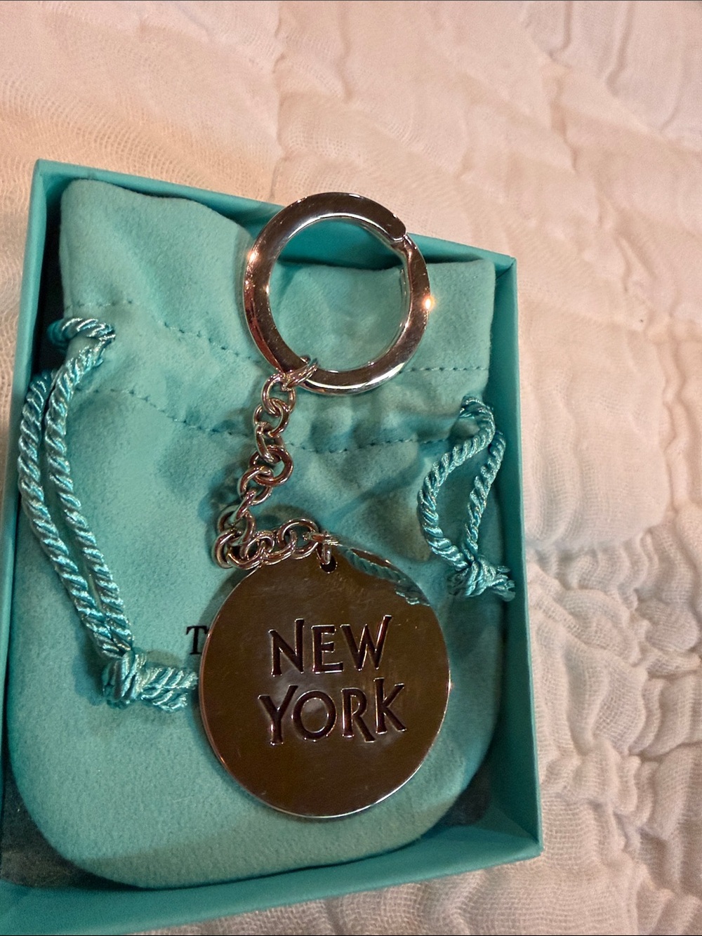 Tiffany & Co. Silver 'New York' Round Key Ring with Turquoise Pouch